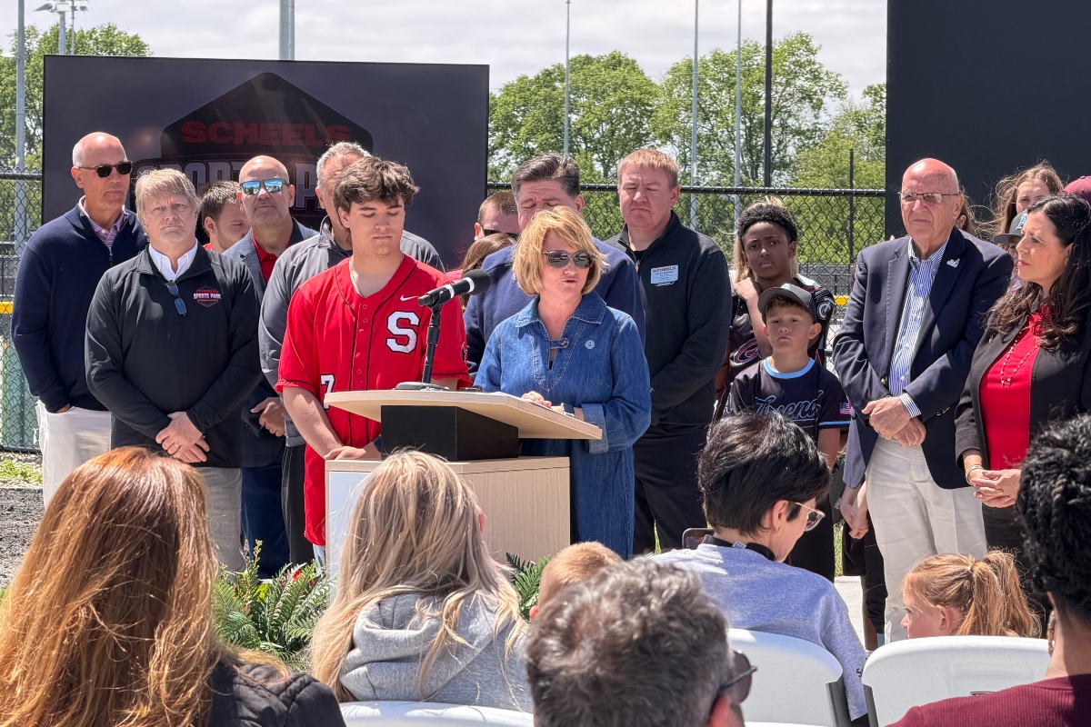 Springfield Public School Superintendent Jennifer Gill is joined by local leaders, Gov. JB Pritzker, and local student athletes Tuesday, April 28, at the ribbon-cutting for the new Scheels Sports Park.