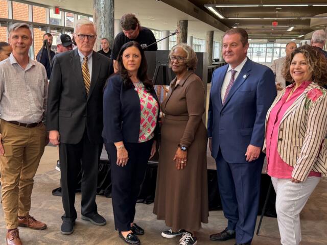 Jay Shanle, left, officially takes over as Executive Director of Downtown Springfield, Inc. April 6.