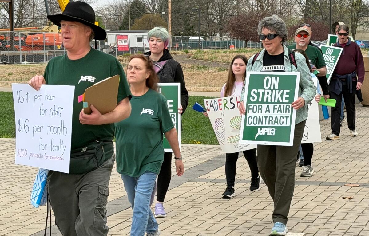 Members of the UIS United Faculty union went on strike Friday morning, picketing around the UIS quad.