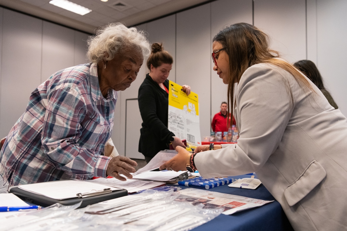 The Master's in Public Health Epidemiology class at a health fair in Crown Plaza hotel Friday, March 27, 2026. The students were passing out radon home detection kits to attendees and talking about the dangers of radon exposure.