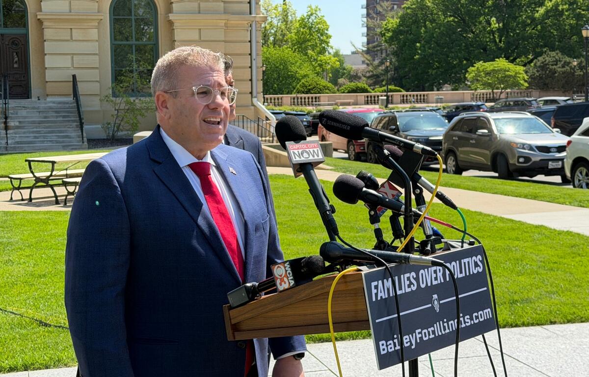 Republican candidate for Illinois Governor, Darren Bailey, speaks Thursday, April 30, outside the Illinois State Capitol.