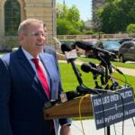 Republican candidate for Illinois Governor, Darren Bailey, speaks Thursday, April 30, outside the Illinois State Capitol.