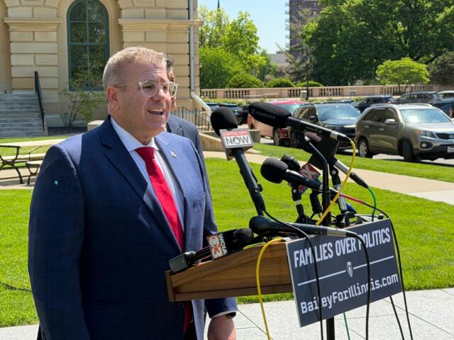 Republican candidate for Illinois Governor, Darren Bailey, speaks Thursday, April 30, outside the Illinois State Capitol.
