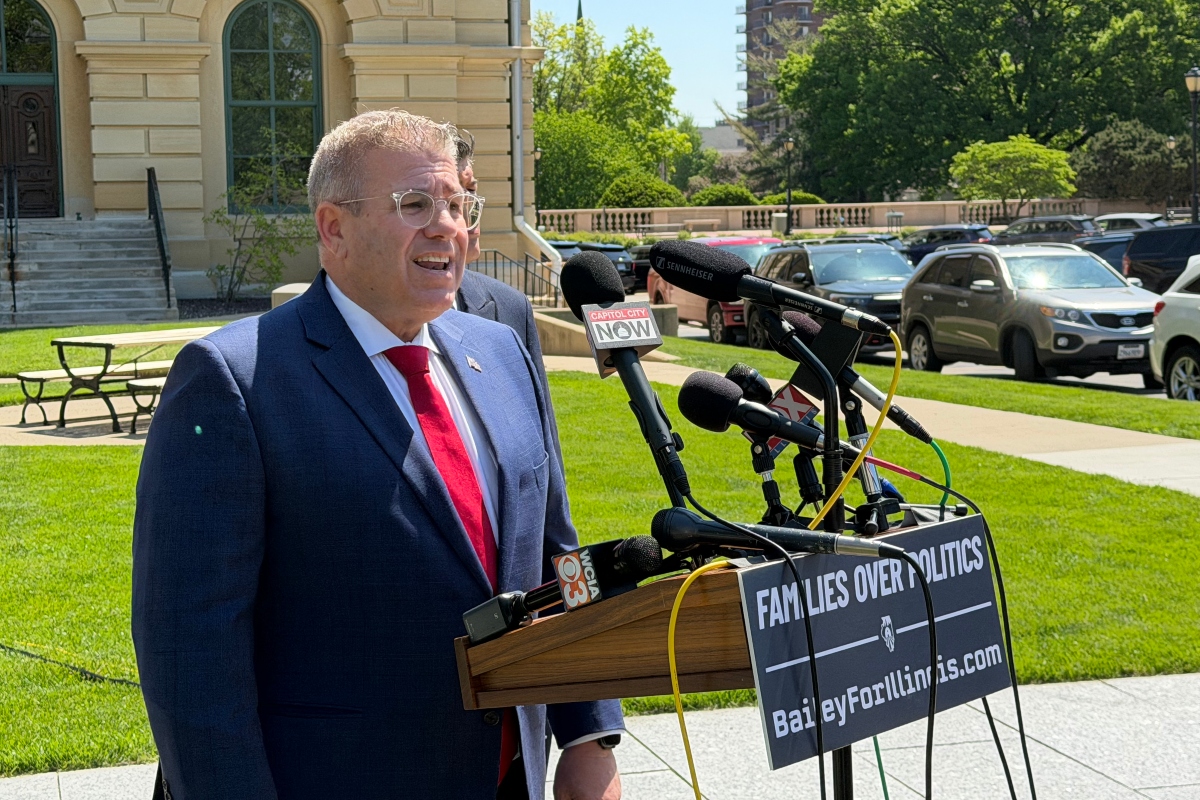 Republican candidate for Illinois Governor, Darren Bailey, speaks Thursday, April 30, outside the Illinois State Capitol.