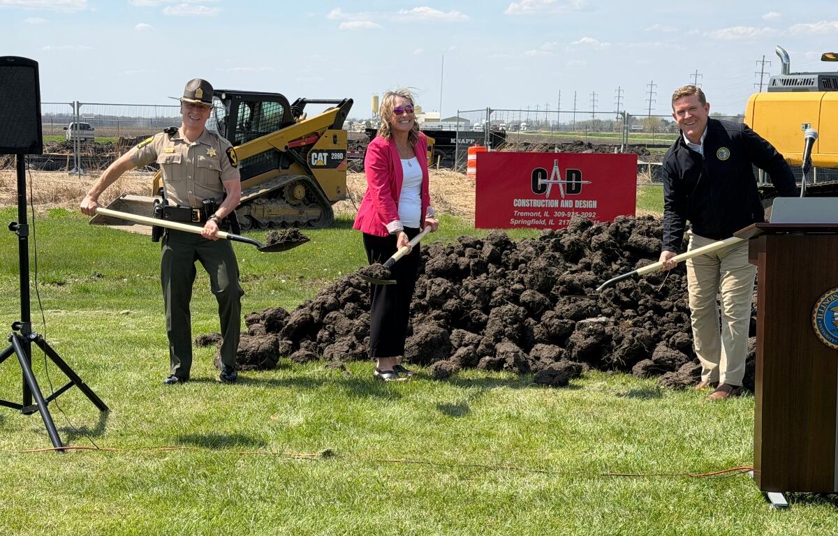 Illinois State Police Director Brendan Kelly, right, helps break ground on a new K-9 training facility in Pawnee, along with Lisa Hennigh, Deputy Director of Construction at the Capital Development Board, and Col. Chris Owen, ISP Division of Patrol.