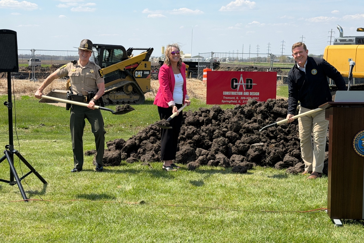 Illinois State Police Director Brendan Kelly, right, helps break ground on a new K-9 training facility in Pawnee, along with Lisa Hennigh, Deputy Director of Construction at the Capital Development Board, and Col. Chris Owen, ISP Division of Patrol.