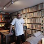 Aadam Jacobs poses in front of LP (long play) record storage bookcase at his home in Chicago, Thursday, March 19, 2026. (AP Photo/Nam Y. Huh)