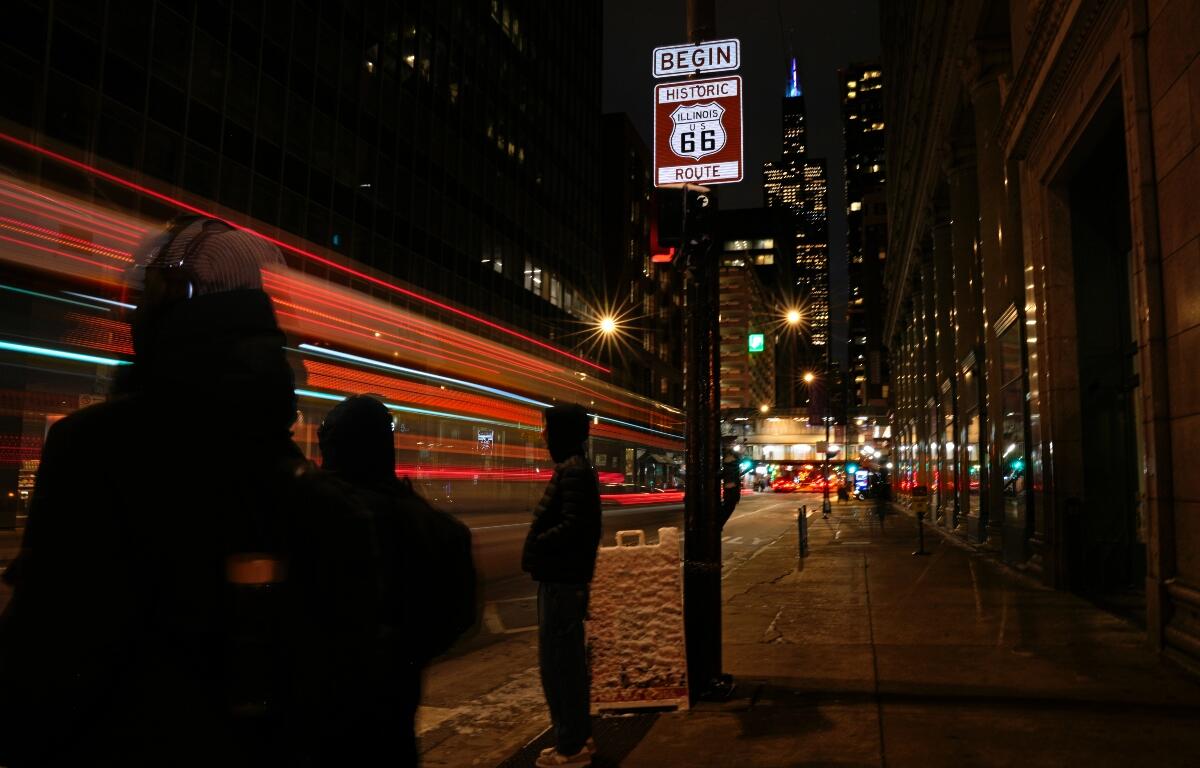 A sign marking the beginning of historic Route 66 stands at the intersection of East Adams Street and South Michigan Avenue, in Chicago, Wednesday, Jan. 14, 2026. (AP Photo/Erin Hooley)