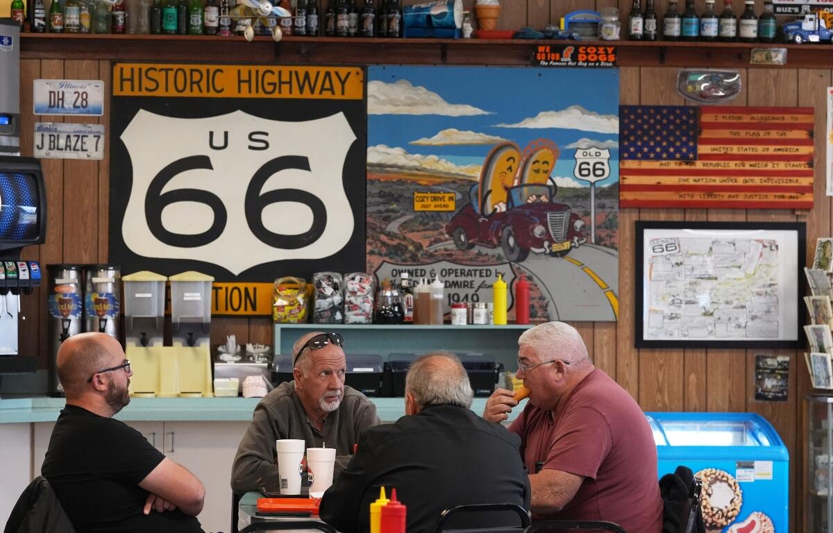 Customers at Cozy Dog Drive In have lunch in Springfield, Ill., Thursday, Nov. 20, 2025. (AP Photo/Jeff Roberson)
