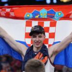 Illinois' Zvonimir Ivisic celebrates after an Elite Eight game against Iowa in the NCAA college basketball tournament Saturday, March 28, 2026, in Houston. (AP Photo/Eric Gay)