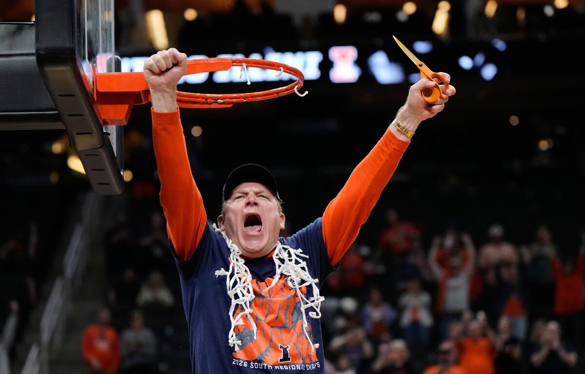 Illinois coach Brad Underwood celebrates after Illinois beat Iowa in an Elite Eight game in the NCAA college basketball tournament Saturday, March 28, 2026, in Houston. (AP Photo/Ashley Landis)