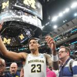 Michigan's Yaxel Lendeborg (23) celebrates after defeating Tennessee in the Elite Eight of the NCAA college basketball tournament, Sunday, March 29, 2026, in Chicago. (AP Photo/Erin Hooley)