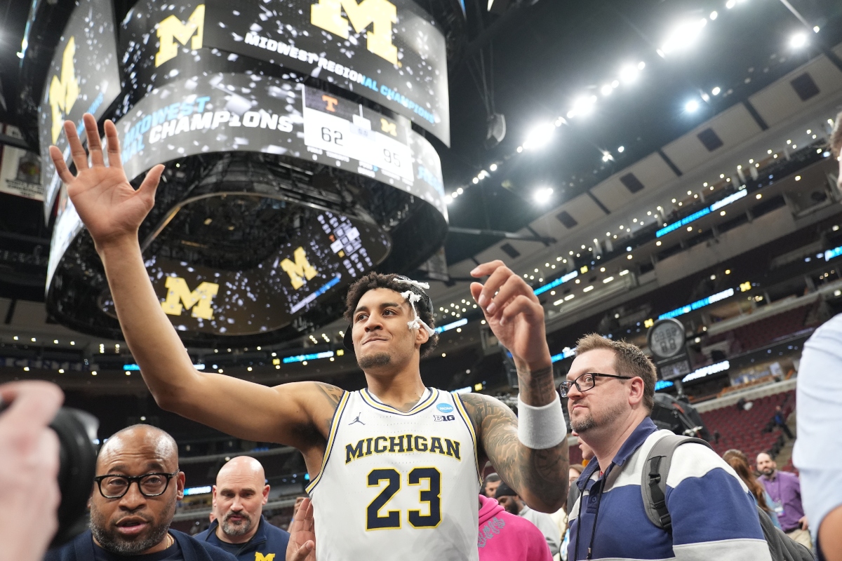 Michigan's Yaxel Lendeborg (23) celebrates after defeating Tennessee in the Elite Eight of the NCAA college basketball tournament, Sunday, March 29, 2026, in Chicago. (AP Photo/Erin Hooley)