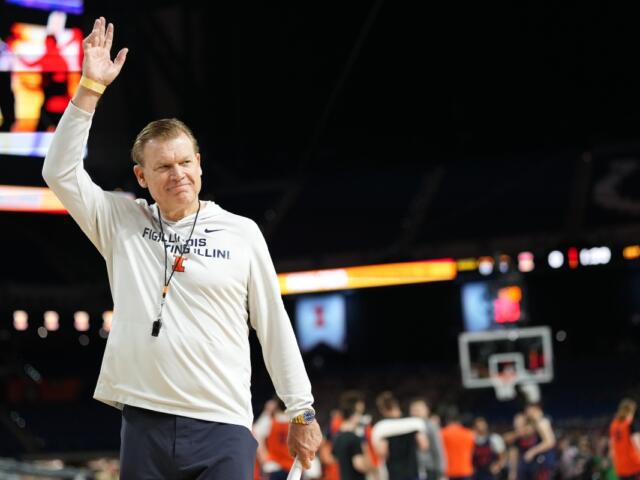 Illinois head coach Brad Underwood waves during practice ahead of a national semifinal NCAA college basketball tournament game against UConn at the Final Four, Friday, April 3, 2026, in Indianapolis. (AP Photo/Abbie Parr)