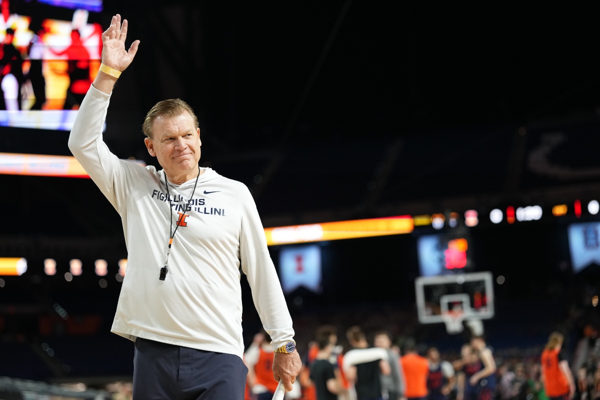 Illinois head coach Brad Underwood waves during practice ahead of a national semifinal NCAA college basketball tournament game against UConn at the Final Four, Friday, April 3, 2026, in Indianapolis. (AP Photo/Abbie Parr)