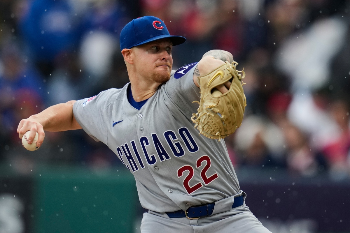 Chicag Cubs' Cade Horton pitches in the rain in the first inning of a baseball game against the Cleveland Guardians in Cleveland, Friday, April 3, 2026. (AP Photo/Sue Ogrocki)