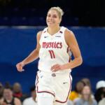 FILE - Washington Mystics' Elena Delle Donne smiles after scoring during a WNBA basketball game against the Chicago Sky Thursday, June 22, 2023, in Chicago. (AP Photo/Charles Rex Arbogast, File)