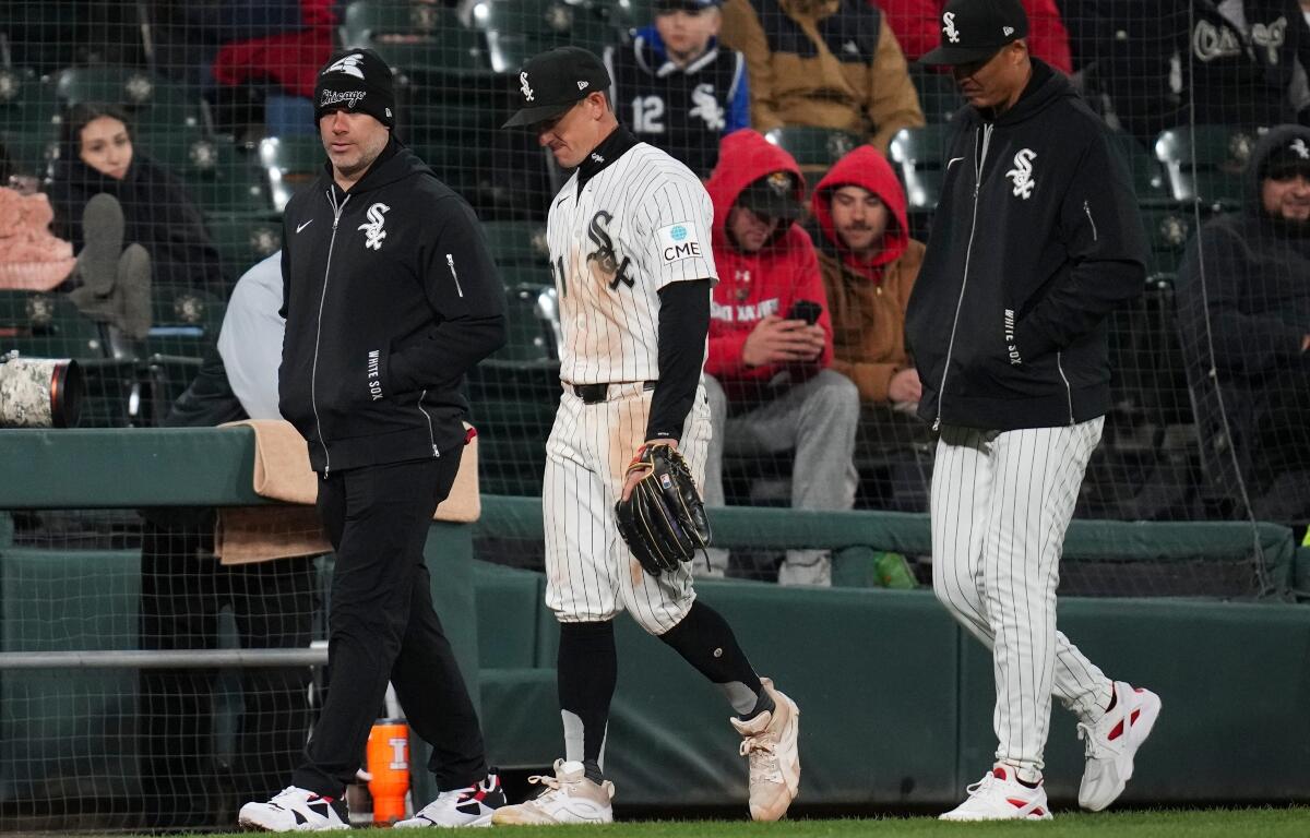 Chicago White Sox left fielder Austin Hays, center, leaves during the fourth inning of a baseball game against the Baltimore Orioles, Monday, April 6, 2026, in Chicago. (AP Photo/Erin Hooley)