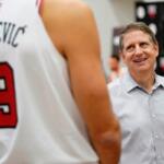FILE - Chicago Bulls President and CEO Michael Reinsdorf, right, talks with Nikola Vucevic during the NBA basketball team's media day, Oct. 2, 2023, in Chicago. (AP Photo/Charles Rex Arbogast, File)