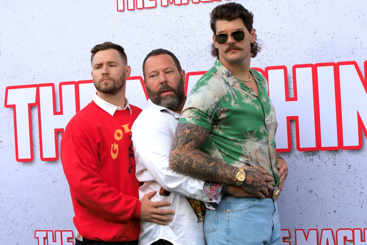 William Compton, Bert Kreischer, Taylor Lewan at The Machine Premiere at the Village Theater on May 25, 2023 in Westwood, CA