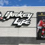 Connor Bedard poster on the side of a building.