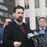 Illinois PIRG Director Abe Scarr speaks to reporters on Jan. 6, 2026, at a demonstration protesting a Peoples Gas rate hike request to the Illinois Commerce Commission. (Capitol News Illinois file photo by Maggie Dougherty)