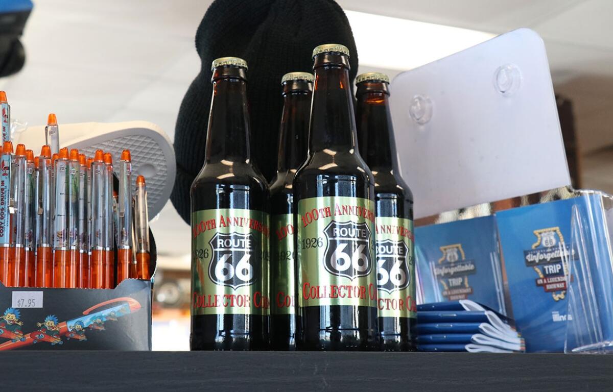 Not for sale, Route 66 Centennial collector soda bottles sat atop the merch shelf. (Medill Illinois News Bureau photo by Chloe Park)