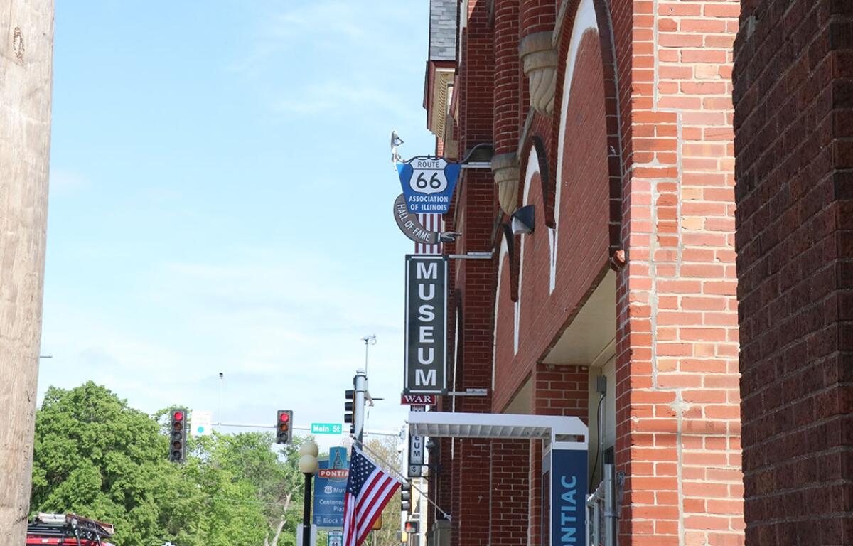 The Route 66 Hall of Fame and Museum sign hung above West Howard Street in downtown Pontiac. (Medill Illinois News Bureau photo by Chloe Park)