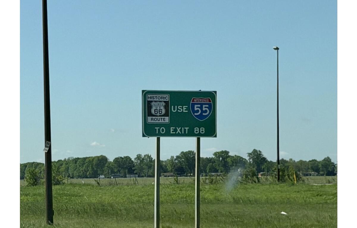 A highway sign directing drivers from from Interstate 55 to historic Route 66 stood along a rural stretch between Springfield and Livingston.