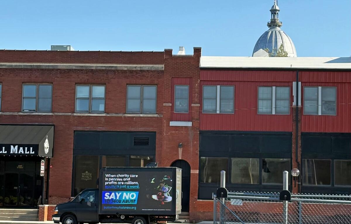 A billboard truck urges lawmakers to “say no to 340B abuse” as it makes its rounds in the Vinegar Hill neighborhood surrounding the Illinois State Capitol. (Capitol News Illinois photo by Jerry Nowicki)