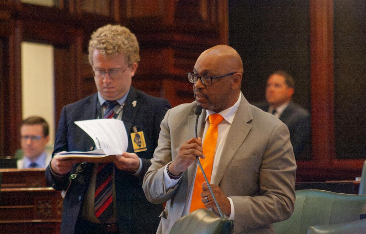 Democratic Rep. Thaddeus Jones speaks on the House floor on his way to passing a pair of bills to regulate the homeowner and auto insurance industries. (Capitol News Illinois photo by Jenna Schweikert)