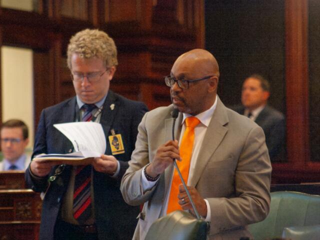 Democratic Rep. Thaddeus Jones speaks on the House floor on his way to passing a pair of bills to regulate the homeowner and auto insurance industries. (Capitol News Illinois photo by Jenna Schweikert)