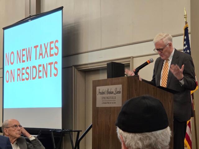 Sangamon County Board Chair Andy Van Meter emphasizes that taxes will not be raised on county residents in order to expand the BOS Center and build a new hotel, in a Greater Springfield Chamber of Commerce event May 19, 2026.