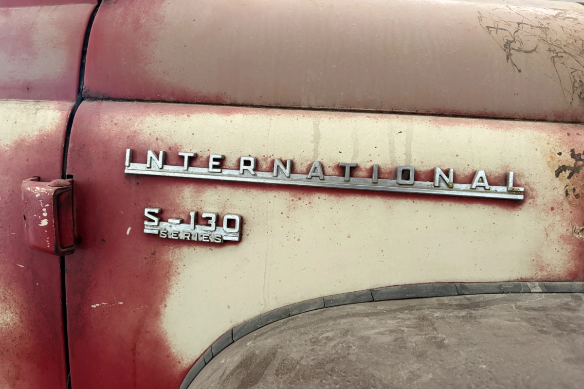The make and series are displayed on the side of a 1956 International Harvester S-130 pickup truck in Mason, Ill., Sunday, May 24, 2026. (AP Photo/Holly Meyer)