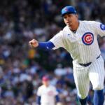 Chicago Cubs relief pitcher Daniel Palencia throws out Pittsburgh Pirates' Joey Bart at first base during the ninth inning of a baseball game in Chicago, Sunday, April 12, 2026. (AP Photo/Nam Y. Huh)