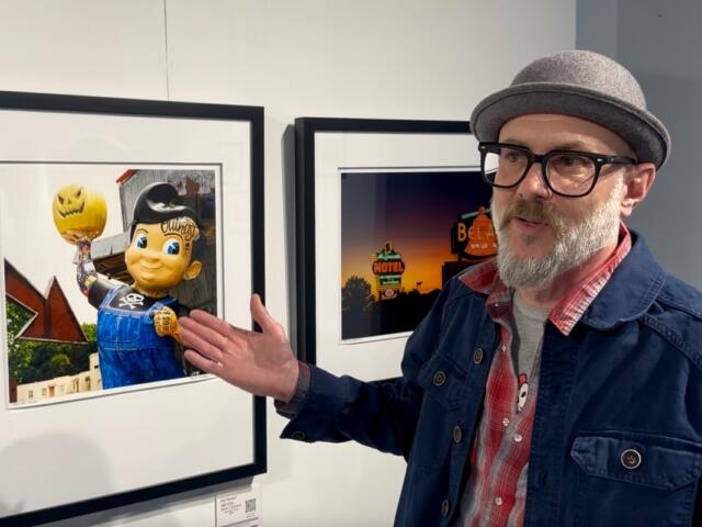 Photographer David J. Schwartz discusses photos he has made while traveling Route 66 over two decades, during an exhibition opening in Springfield, Ill., on March 27, 2026. (AP Photo/John O'Connor) Screenshot