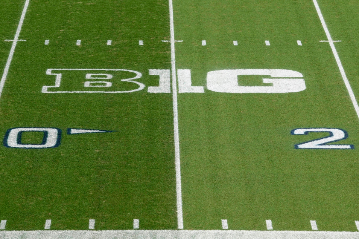 FILE - The Big Ten logo is painted between the 30 and 40 yard lines at Beaver Stadium before an NCAA college football game between Indiana and Penn State in State College, Pa., on Saturday, Oct. 2, 2021. (AP Photo/Barry Reeger, File)