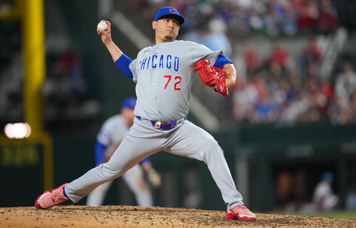 Chicago Cubs pitcher Javier Assad throws to the Texas Rangers during the sixth inning of a baseball game Friday, May 8, 2026, in Arlington, Texas. (AP Photo/Julio Cortez)