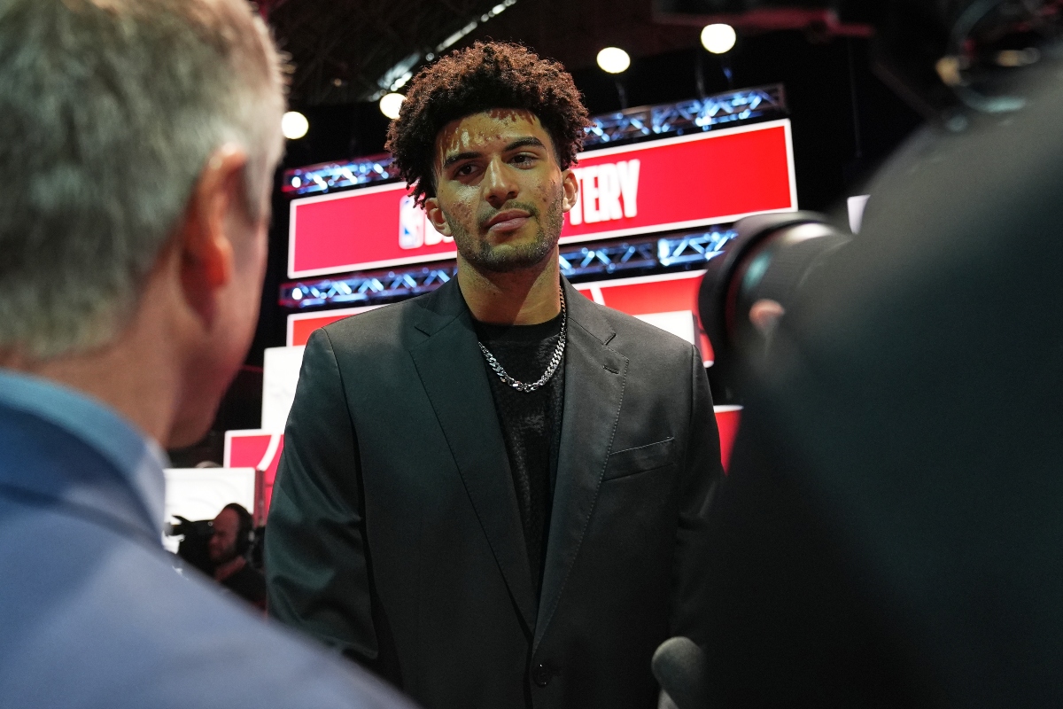 Duke forward Cameron Boozer talks to media during the NBA basketball draft lottery in Chicago, Sunday, May 10, 2026. (AP Photo/Nam Y. Huh)
