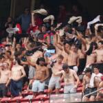 Fans cheer and wave their shirts above their heads during the fourth inning of a baseball game between the St. Louis Cardinals and the Kansas City Royals Saturday, May 16, 2026, in St. Louis. (AP Photo/Jeff Roberson)
