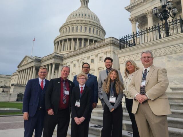 A bipartisan group of election officials from Illinois visit the U.S. Capitol. Pictured left to right are Tazewell County Clerk John Ackerman, Knox County Clerk Scott Erickson, Christian Ackerman, Lake County Clerk Anthony Vega, Alexander County Clerk Zachary Price, Miley Dolder, Putnam County Clerk Tina Dolder, and Tazewell County Chief Deputy Clerk Dan Sullivan. (Photo provided by John Ackerman)