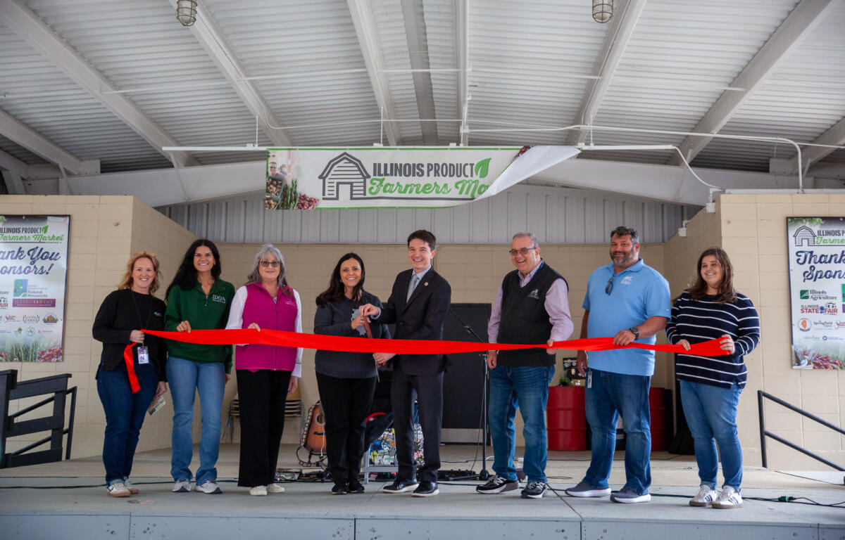 Ribbon cutting kicks of first Farmers Market of the season.