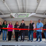 Ribbon cutting kicks of first Farmers Market of the season.