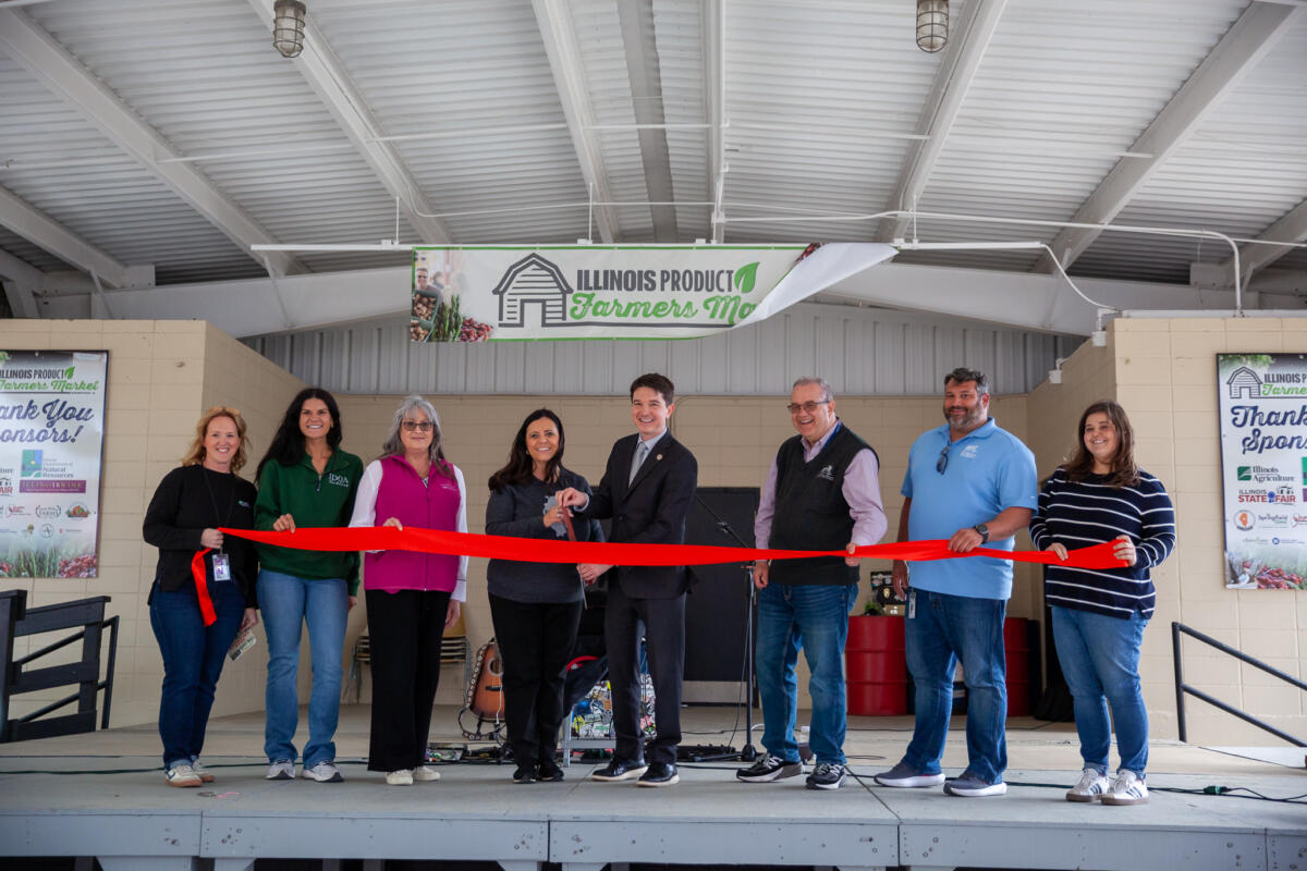 Ribbon cutting kicks of first Farmers Market of the season.