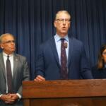 Senate Republican Leader John Curran is flanked by fellow Republicans Sen. Dave Syverson and Sen. Jil Tracy as he calls on the governor to opt into a federal school choice program. (Capitol News Illinois photo by Peter Hancock)