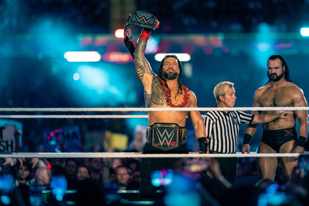 Cardiff, Wales - September 3rd 2022: WWE Champion Roman Reigns holding up the championship belt in the ring at WWE Clash at the Castle