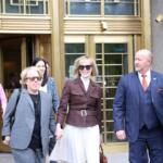 New York, NY USA - May 9 2023: E. Jean Carroll smiles as she leaves the courtroom after a jury found former President Trump liable for sexual abuse and defamation.