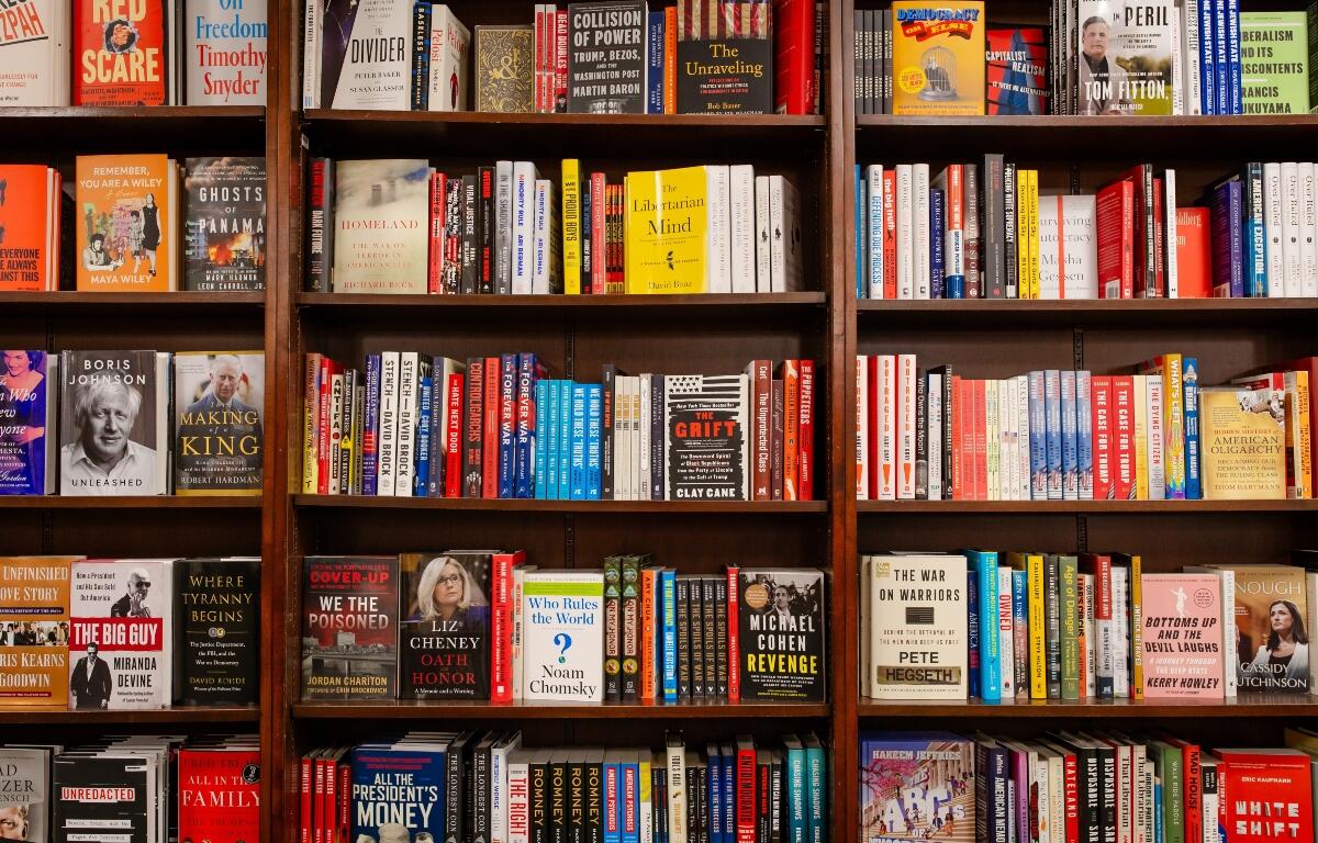 New York City, NY US - April 16, 2025: books displayed for sale on shelves in even rows against a wall at Barnes and Noble, NYC. Book display at a bookshop. Interior of a bookstore