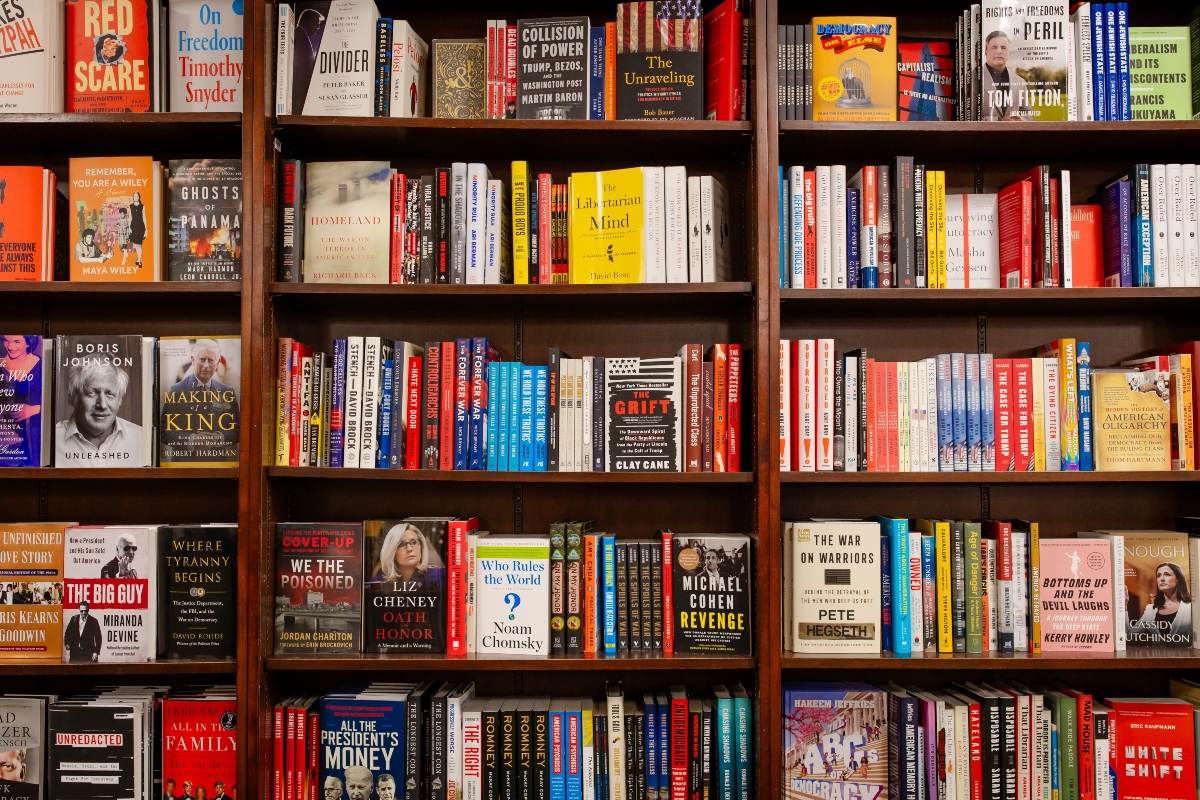 New York City, NY US - April 16, 2025: books displayed for sale on shelves in even rows against a wall at Barnes and Noble, NYC. Book display at a bookshop. Interior of a bookstore