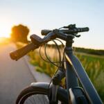 E-bike on the country road at sunset